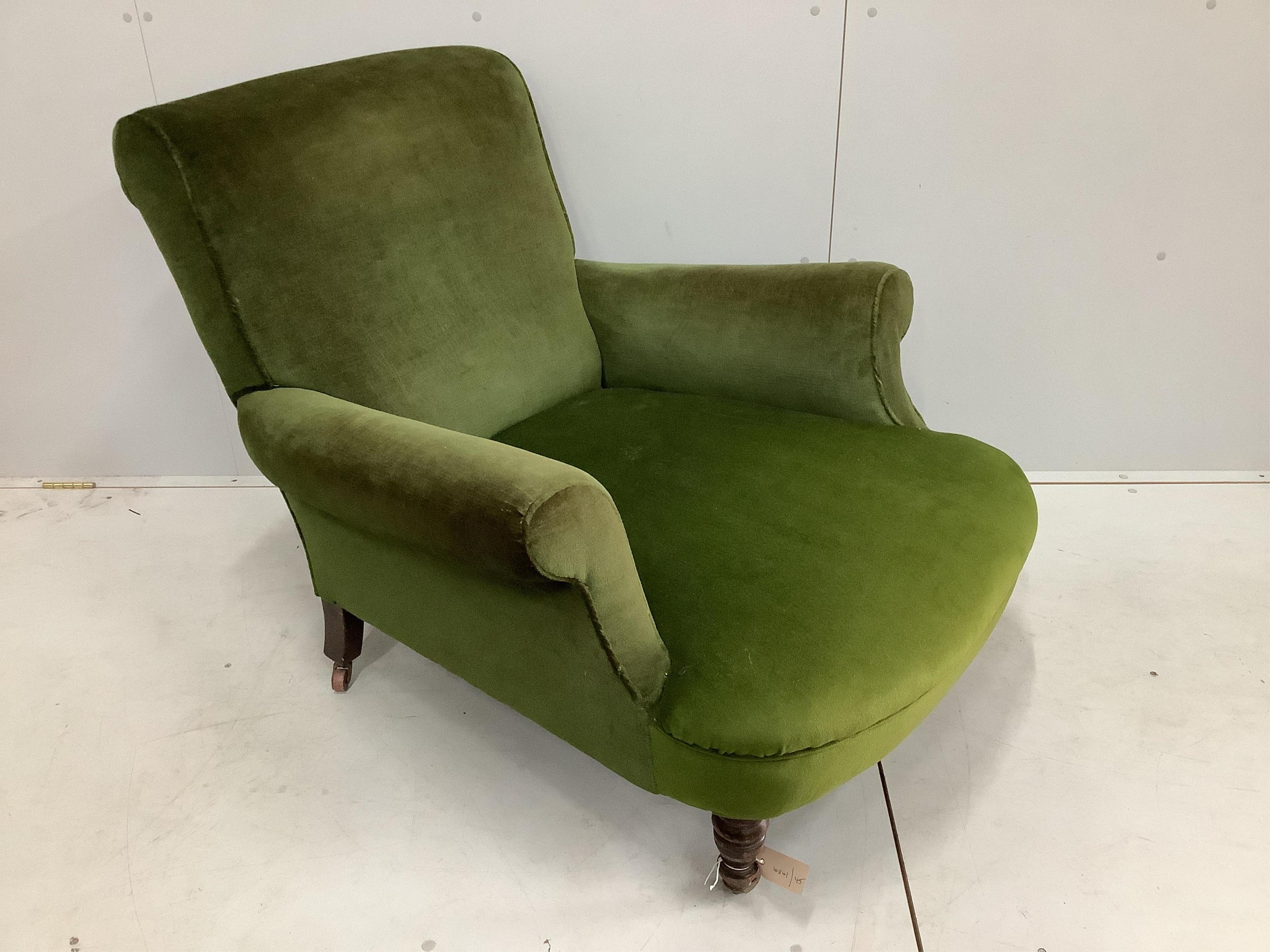 A Victorian Howard style upholstered armchair, width 90cm, depth 106cm, height 84cm